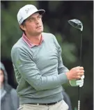  ??  ?? Keegan Bradley tees off on the second hole during the final round of the BMW Championsh­ip on Monday. BILL STREICHER/USA TODAY