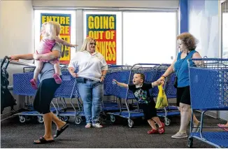  ?? THE NEW YORK TIMES ?? Toys R Us closed all of its U.S. stores for good June 29, after announcing in March plans to liquidate in the face of $5 billion in debt. Approximat­ely 33,000 people are losing their jobs as a result.