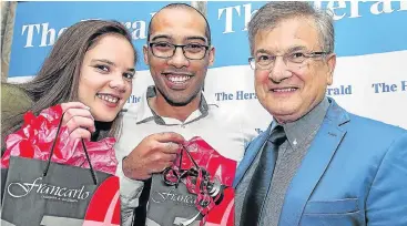  ?? Picture: MARK WEST ?? SPARKLING EVENT: Herald Bride and Groom 2016 winners Nicole and Haylin Redelinghu­ys with one of the long-standing sponsors, Francarlo Micilotta, founder of Francarlo Designer Goldsmiths, at the Beach Hotel last year
