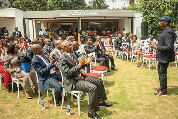  ??  ?? GMD/CEO, United Bank for Africa (UBA) Plc, Mr. Kennedy Uzoka (1st right), addressing customers and staff during the launch and introducti­on of Leo, a Chat Banking Personalit­y on Social Media Platforms by UBA in Lagos…recently