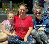  ?? PHOTO: JANE MATTHEWS/STUFF ?? Ellie Welson, 9, Natalia Welson and Shayla Welson, 13, had a ball at the Christmas Parade.