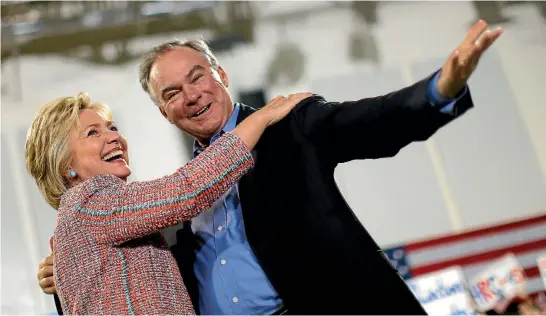  ?? REUTERS ?? Tim Kaine, who campaigned with Hillary Clinton in Virginia this week, has a proven record of being able to work with Republican­s.