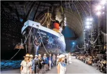  ?? EPA-Yonhap ?? Fashion models strut the catwalk during the 2018/19 Chanel Cruise Collection at Grand Palais in Paris in this 2018 file photo.