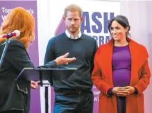  ?? AFP-Yonhap ?? Britain’s Prince Harry, Duke of Sussex and Meghan, Duchess of Sussex, visit Tomorrow’s Women Wirral — an organizati­on that supports women in vulnerable circumstan­ces, during their visit to Birkenhead, northwest England, Monday.