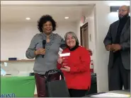  ?? JOHN BUTLER — THE NEWS-HERALD ?? Kathy Gamber receives an Employee of the Year award for her work in Richmond Heights Human Resources.