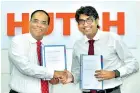  ?? ?? Hutch CEO Thirukumar Nadarasa with edotco Acting Country Managing Director Gayan Koralage