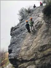  ?? ?? Youngsters learned abseiling skills and how to descend safely.