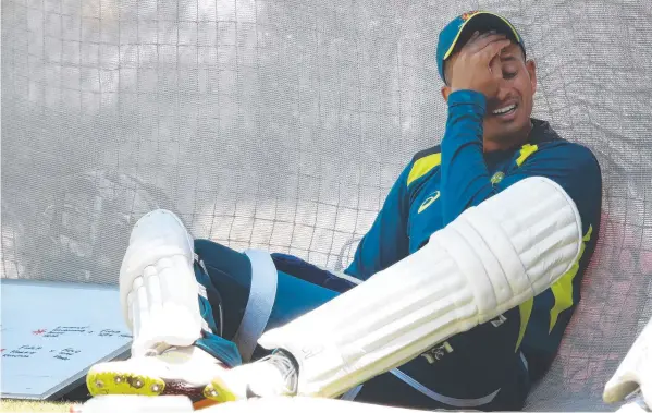  ??  ?? MONITORED: Australian batsman Usman Khawaja takes a break during an Australian nets session yesterday at Adelaide Oval.