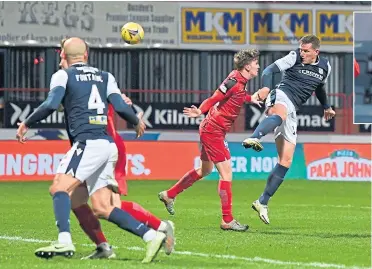  ??  ?? Dundee’s Lee Ashcroft, right, heads home to make it 3-2 to the Dens Park side