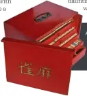  ??  ?? An unusual ‘Red Lacquered’ Chinese mahjong set c1920, £650, Luke Honey Ltd.