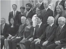  ?? SEAN KILPATRICK/THE CANADIAN PRESS ?? When Prime Minister Justin Trudeau appointed his new cabinet, Canada became the fourth country with ministeria­l gender parity, a report said.