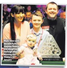  ??  ?? Mark Allen with his wife Kyla, stepson Robbie and daughter Harleigh after winning the Masters in January