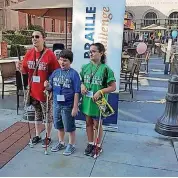  ?? PROVIDED] [PHOTO ?? Richelle Zampella, Hunter Kelley and Katelynn Zampella, students from the Oklahoma School for the Blind, were in Los Angeles during the recent Braille Challenge.