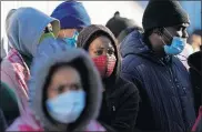  ?? [GREGORY BULL/ THE ASSOCIATED PRESS] ?? Asylum seekers wait for news of policy changes at the border, Feb. 19 in Tijuana, Mexico.