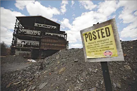  ??  ?? TOP: This April 29 photo shows the St. Nicholas Coal Breaker in Mahanoy City, Pa.