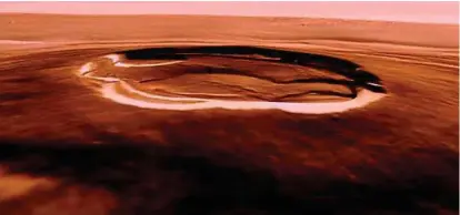  ??  ?? Mightiest mountain: A graphic reproducti­on of the breathtaki­ng Olympus Mons on Mars