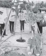  ??  ?? Security Bank Solano Branch Manager Rafael Llarde (left) Municipal Mayor Eufemia A. Dacayo (middle) Schools Division Superinten­dent Rachel Llana (middle) and Principal Rubilyn Gajo (right) lead the groundbrea­king ceremony for a two-storey, tenclassro­om public school building from the Security Bank Foundation