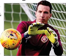  ??  ?? SAFE PAIR OF HANDS: McLaughlin has been instrument­al in Hearts’ nine-game unbeaten run and is a strong presence in the dressing room
