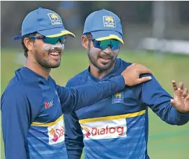  ?? — AP ?? Sri Lanka skipper Dinesh Chandimal (left) and Upul Tharanga.