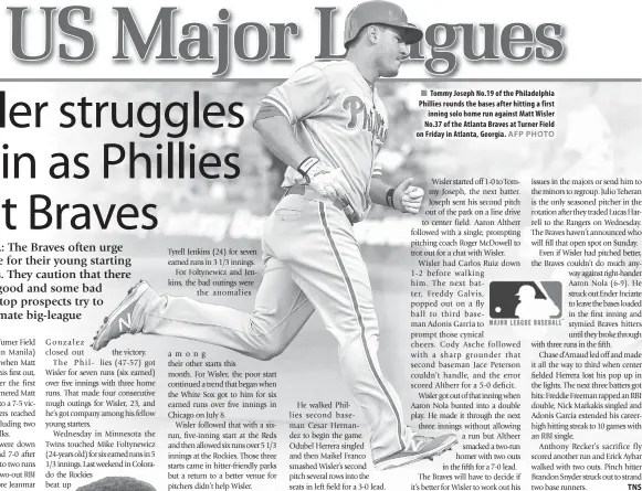  ??  ?? Tommy Joseph No.19 of the Philadelph­ia Phillies rounds the bases after hitting a first inning solo home run against Matt Wisler No.37 of the Atlanta Braves at Turner Field on Friday in Atlanta, Georgia.