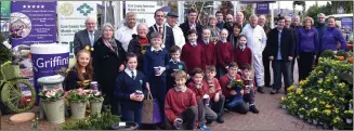  ??  ?? National school pupils, competitio­n organisers and staff from Cork County Council at the launch of the 2018 Muintir na Tire School Garden Competitio­n. Photos: Mike English.