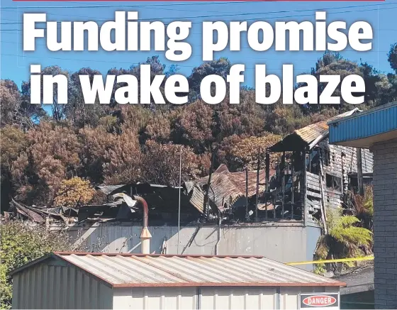  ?? ?? The destroyed Mount Black Lodge at Rosebery after Tuesday’s bushfire, which threatened the West Coast town.