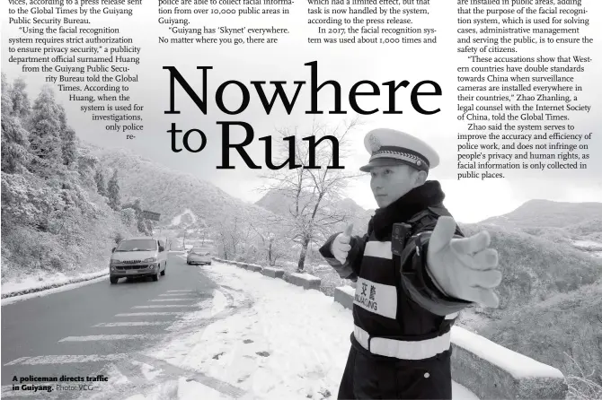  ?? Photo: VCG ?? A policeman directs traffic in Guiyang.