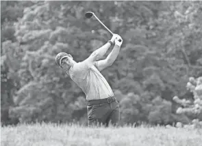  ?? ADAM CAIRNS/COLUMBUS DISPATCH ?? Adam Scott says Rory Mcilroy, here teeing off at No. 18 at the Memorial on Saturday, is the "poster" of having great balance at the end of his swing.