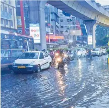  ?? R. PAVAN ?? After heavy rains lashed the city, water stagnated near the Khairataba­d Metro Rail station. —