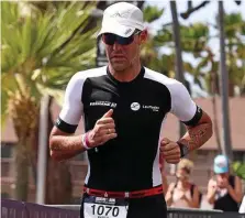  ?? IRONMAN ?? Die Hitze machte Marco Koblitz beim Marathon arg zu schaffen. Doch er blieb stark, kam ins Ziel