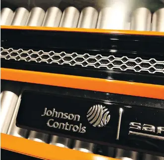  ?? DANIEL ACKER/BLOOMBERG ?? Johnson Controls is not seen as a major player in the lithium-ion market, although it has a facility to make the batteries used in electric vehicles. It sold its Power Solutions business Tuesday.