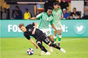  ?? PATRICK SEMANSKY/ASSOCIATED PRESS ?? D.C. United forward Griffin Yow (22), shown in action in 2019, was urged by his teammates to register to vote once he turned 18. The team is involved in the political process.