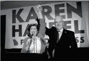  ?? ASSOCIATED PRESS ?? REPUBLICAN CANDIDATE FOR Georgia’s 6th District Congressio­nal seat Karen Handel celebrates with her husband Steve as she declares victory during an election-night watch party Tuesday in Atlanta.