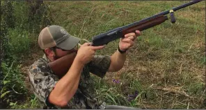  ?? Arkansas Democrat-Gazette/BRYAN HENDRICKS ?? A hull flies from Dusty McDaniel’s 16-gauge Remington Model 11 on Sunday as he fires at a dove in Pulaski County.