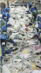  ?? IAN KUCERAK ?? Workers sort recycling at the Edmonton Waste Management Centre. A new report says more waste diversion is possible — if residents buy in.