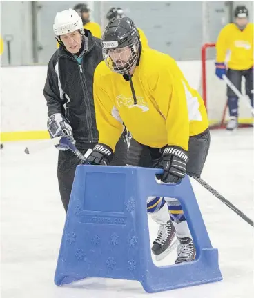  ?? SHAUGHN BUTTS ?? Juris Graney’s first week as an Aussie on ice involved pushing a plastic children’s skating device around the Clareview Arena.