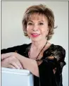  ?? PHOTO BY LORI BARRA ?? Marin author Isabel Allende reads from her works on Thursday at the College of Marin's James Dunn Theatre.