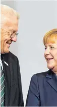  ?? Foto: dpa ?? Politiker Kretschman­n, Merkel: „Nicht die Zeit für Experiment­e“.