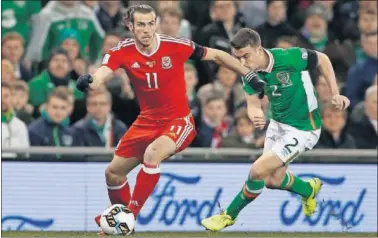  ??  ?? EL CENTRO DE TODO. Bale, ayer, en una arrancada en el partido jugado ante Irlanda.