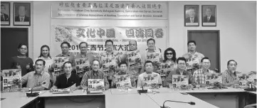  ??  ?? Wee (seated fourth right), Ko (seated third left) and Consul-General for the People’s Republic of China in Kuching Fu Jijun (seated fourth left) are seen with organising committee members at the press conference.