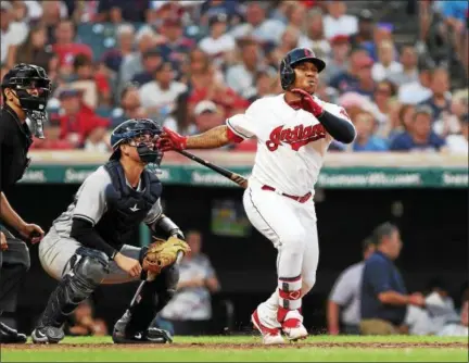  ?? TIM PHILLIS — THE NEWS-HERALD ?? Jose Ramirez watches his RBI triple against the Yankees on July 13.