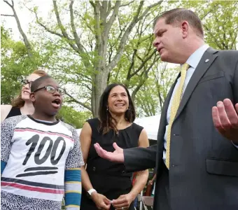  ?? ANGELA ROWLINGS PHOTOS / HERALD STAFF FILE ?? DIFFERENT TIMES CALL FOR DIFFERENT MEASURES: Boston Public Schools Superinten­dent Brenda Cassellius and Boston Mayor Martin Walsh were interactin­g with students face-to-face last spring, such as this event at the Franklin Park Zoo, but this year the coronaviru­s has become a concern and high school graduation will be done in a televised and online event.