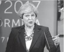  ??  ?? British Prime Minister Theresa May speaks during a news conference in the Sicilian town of Taormina, Italy, May 26.