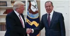  ?? RUSSIAN FOREIGN MINISTRY/THE ASSOCIATED PRESS ?? Donald Trump met with Russian Foreign Minister Sergey Lavrov Wednesday to discuss broader co-operation on resolving Mideast conflicts.