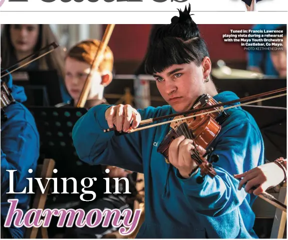  ?? PHOTO: KEITH HENEGHAN ?? Tuned in: Francis Lawrence playing viola during a rehearsal with the Mayo Youth Orchestra in Castlebar, Co Mayo.