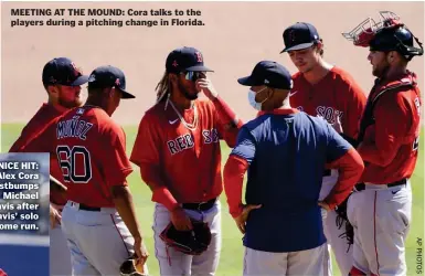  ??  ?? MEETING AT THE MOUND: Cora talks to the players during a pitching change in Florida.