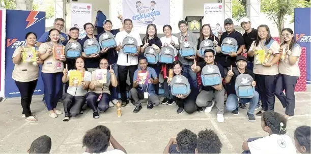  ?? ?? EMPOWERING 500 STUDENTS IN PORAC SCHOOL. Vantage Energy and Mekeni Food Corporatio­n team up to provide Villa Maria Integrated School students with supplies and equipment to enhance their learning experience.