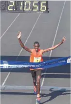  ?? — AFP ?? Brimin Kipkorir Misoi from Kenya runs to win the 36th Athens Classic Marathon ‘The authentic’ at the Panathenai­c stadium in Athens on Sunday.