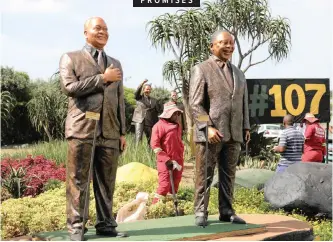  ?? EPA-EFE African News Agency (ANA) ?? WORKERS clean the area around statues of ANC leaders that have been erected along the M4 Ruth First highway in Durban, as part of the ANC’s election manifesto launch at the Moses Mabhida Stadium in the city. |