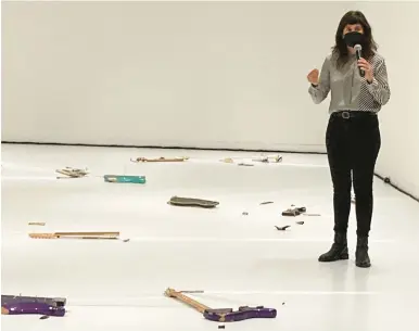  ?? CHRISTOPHE­R ARNOTT PHOTOS ?? Israeli artist Naama Tsabar amid her “Melodies of Certain Damage (Opus 6)” at the Wadsworth Atheneum. She and several local musicians will perform on the broken electric guitars that comprise the exhibit on its closing weekend Sept. 10 and 11.